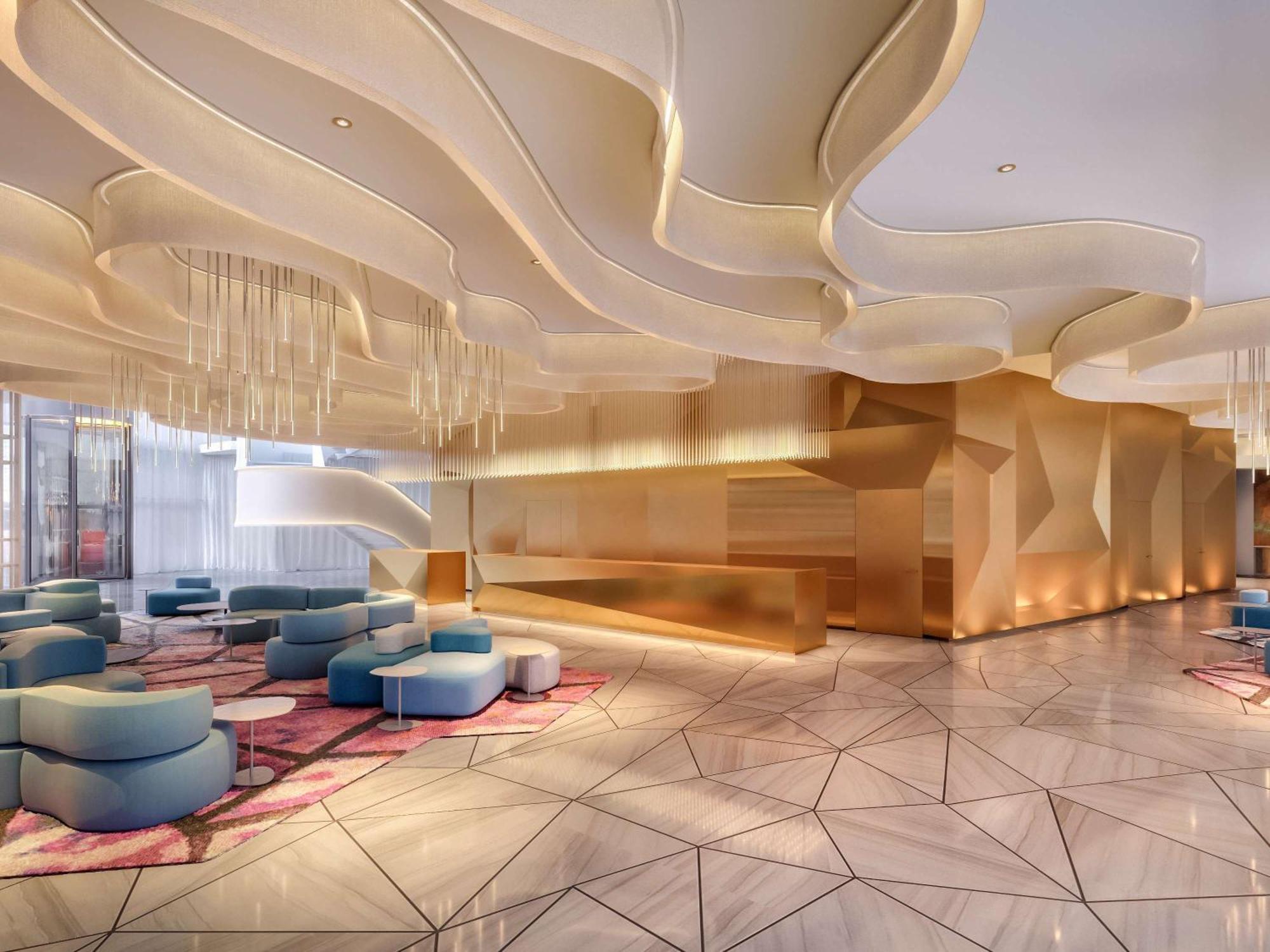 Moevenpick Hotel & Apartments Ghala Maszkat Kültér fotó The lobby of the hotel