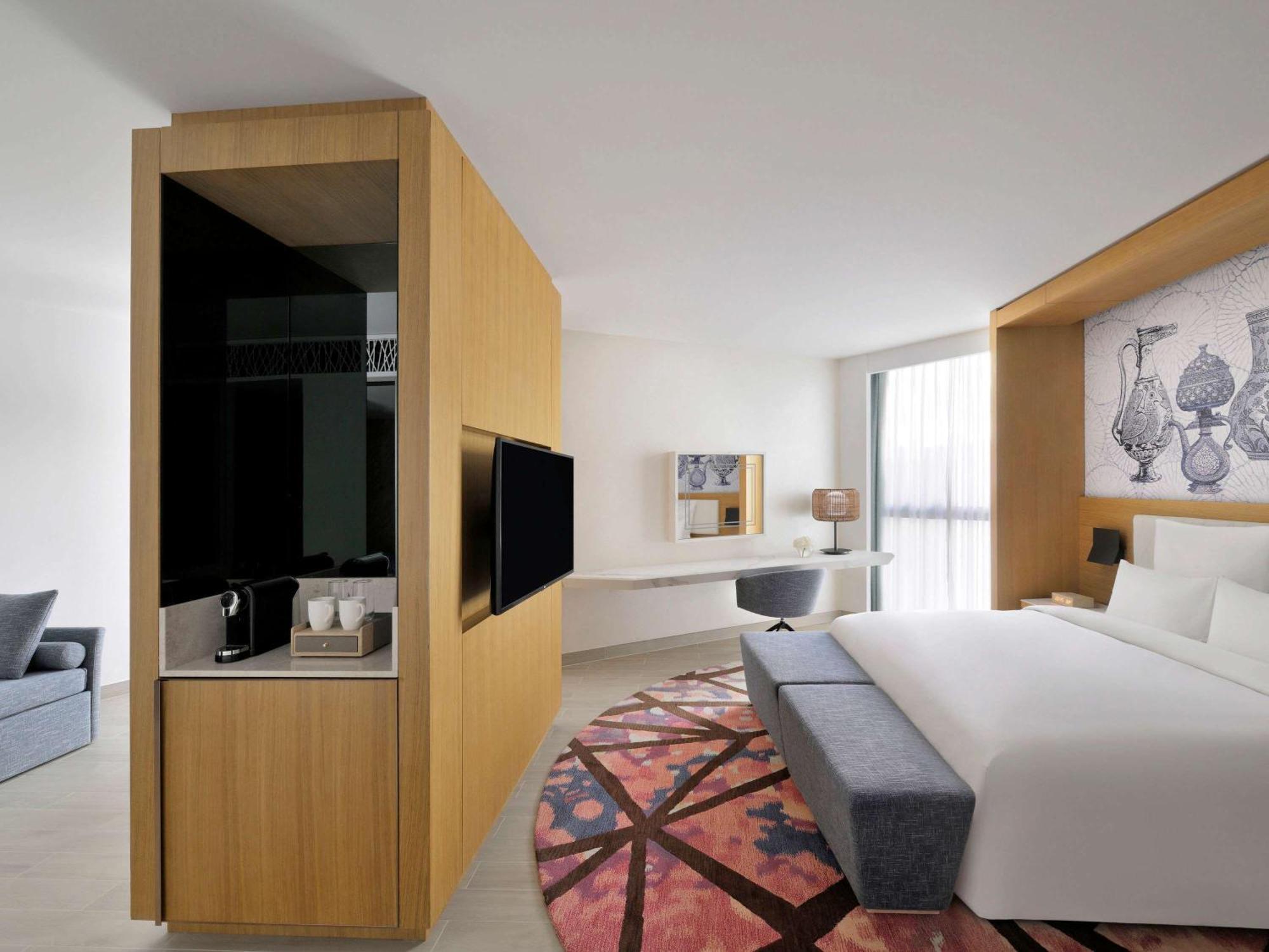 Moevenpick Hotel & Apartments Ghala Maszkat Kültér fotó Deluxe room