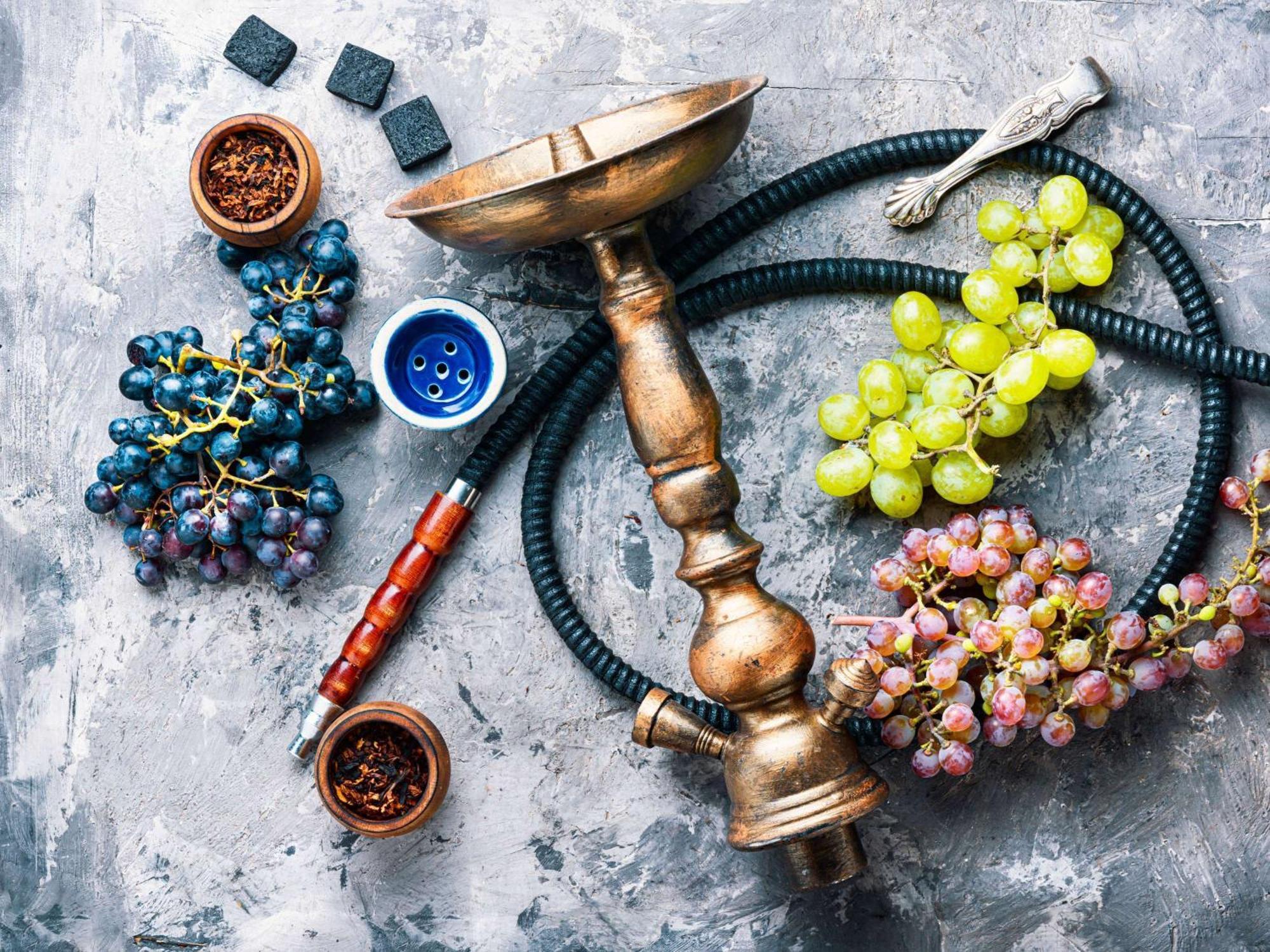 Moevenpick Hotel & Apartments Ghala Maszkat Kültér fotó A hookah with grape flavor