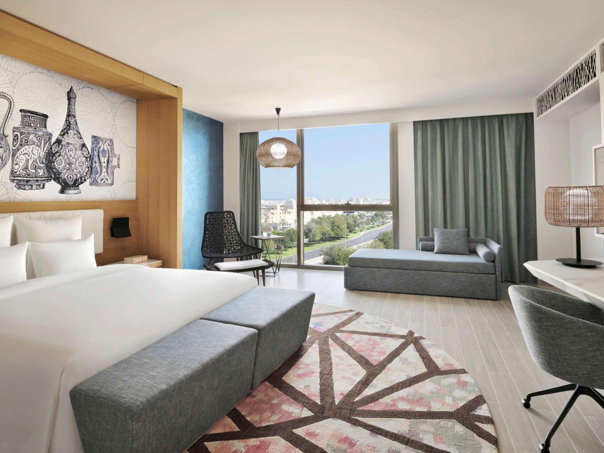 Moevenpick Hotel & Apartments Ghala Maszkat Kültér fotó Deluxe Room